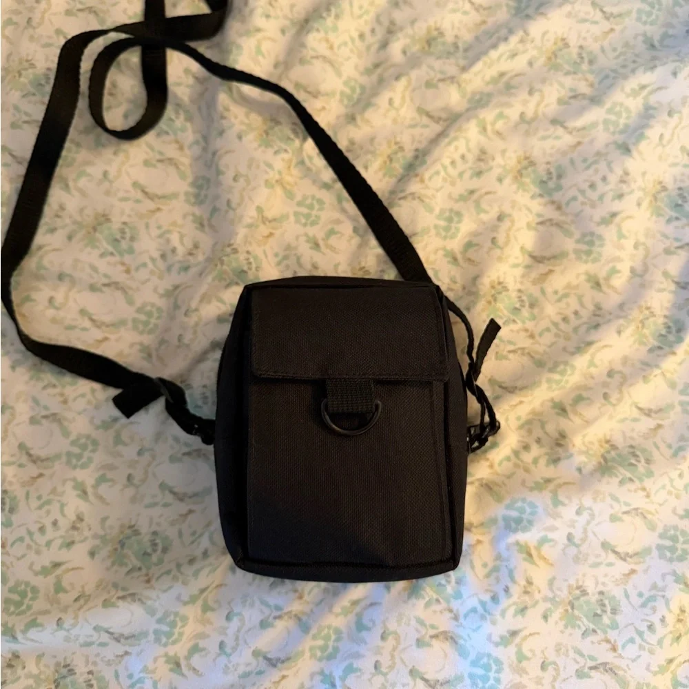 Canon Red Digital Camera with Black Accessories